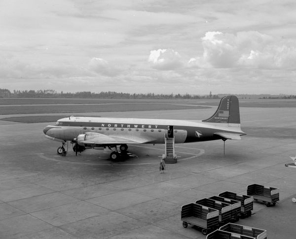 Northwest Orient Airlines Douglas DC-4-1009 Skymaster N6402